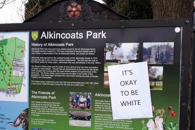 The poster in Alkincoats Park in Colne.