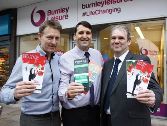 (From left to right) Neil Hutchinson, Scott Bryce and Gerard Vinton from Burnley Leisure outside the new store.