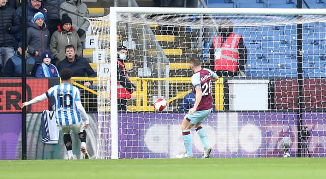 <p>Huddersfield Town's Josh Koroma scores his side's equalising goal</p>