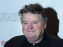 British actor Robbie Coltrane attends a photocall for the film Great Expectations in central London on October 21, 2012.  