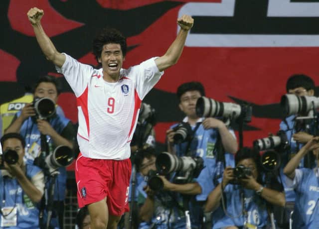 Ki Hyeon Seol of South Korea celebrates scoring the late equaliser during the FIFA World Cup Finals 2002 Second Round match against Italy (Photo by Brian Bahr/Getty Images)