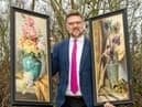 Charles Hanson, owner of Hansons Auctioners, with Queen Victoria’s paintings.  