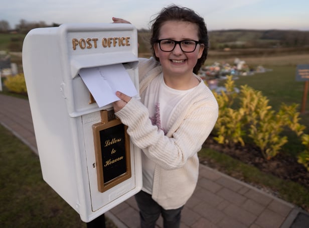 <p>Matilda Handy, 9, and mum, Leanne Handy 45 with their letter box to heaven, in Gedling Crematorium, which allows grieving members of the public to write a letter to their loved ones who have passed away.  (Picture credit by SWNS)</p>