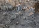 An aerial view of work machines and diggers at the site of collapsed buildings on February 16, 2023 in Hatay, Turkey