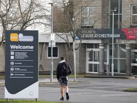 A man has been arrested on suspicion of terrorism offences after a woman was stabbed outside a leisure centre. The woman was attacked outside the centre in Cheltenham on Thursday night and was taken to hospital where she is now said to be in a stable condition. 