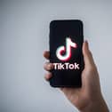 A letter from the Inter-Parliamentary Alliance on China (IPAC) to the information commissioner argues TikTok could be in breach of UK law. (Photo by LOIC VENANCE / AFP) (Photo by LOIC VENANCE/AFP via Getty Images) 