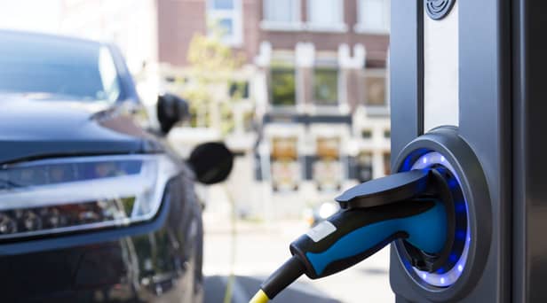 Electric vehicles are at the forefront of new driving laws and offences introduced in April 2023 - Credit: Adobe