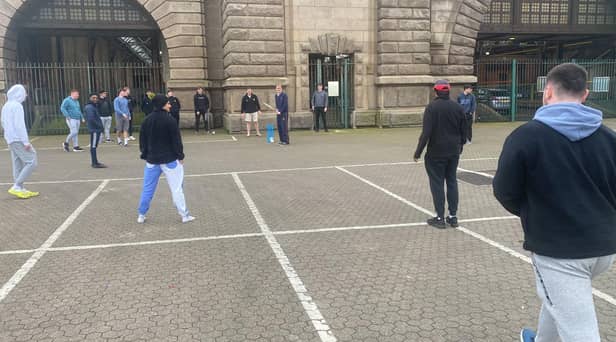 The cricketers passing the time at Dover with an impromptu match (Photo: SWNS)