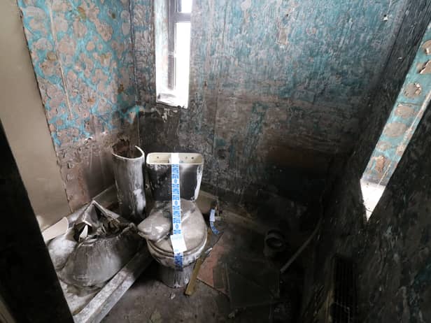 A house of horrors where potential buyers are banned from viewing it in person and the loo is taped off with ‘do not use’ labels is set to go under the hammer.