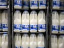 Aldi, Lidl and Asda have joined their rivals Sainsbury’s and Tesco in cutting the price of milk by at least 5p.  Photo by Daniel LEAL / AFP) (Photo by DANIEL LEAL/AFP via Getty Images)