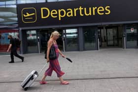 Travellers at Gatwick Airport on July 30, 2021 in London, England. (Photo by Dan Kitwood/Getty Images)