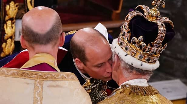  Prince William kisses his father, Britain’s King Charles III as he pays homage (Photo: Getty Images)