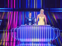 Eurovision hosts Julia Sanina and Hannah Waddingham with the Eurovision trophy