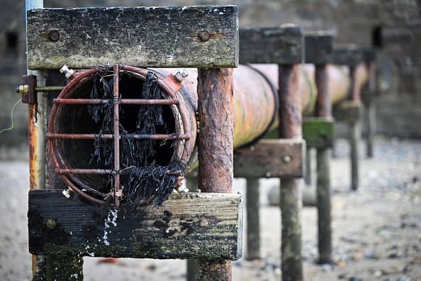 Rise in bills expected as England’s water companies promise to tackle sewage spills (Photo by GLYN KIRK/AFP via Getty Images)