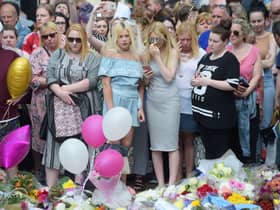 Floral tributes after a minute's silence in St Ann's Square, Manchester, to remember the victims of the terror attack in the city. A report examining security at Manchester Arena where 22 people were murdered and hundreds were injured in a suicide bombing at the end of an Ariana Grande concert in May 2017 was published today. (Photo: PA)