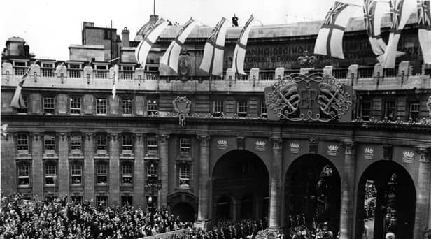 Queen Elizabeth II Coronation carriage and procession coming through Admiralty Arch on the way from Westminster Abbey to Buckingham Palace