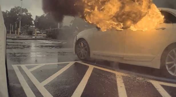 Watch the terrifying moment childen were left in a car that caught fire