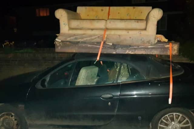 A UK motorist driver has been convicted for travelling with a strange item on the roof - of his convertible car.