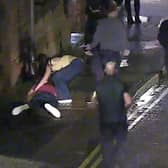A man is left lying on the ground after being repeatedly punched by Joshua Saxton.