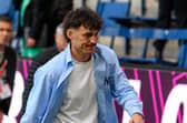 Connor Roberts thanks the fans following the 2-2 draw with Aston Villa at Turf Moor. Photo: Kelvin Lister-Stuttard