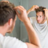 The Sons bundle combines a 5% minoxidil solution with a caffeine shampoo as part of a daily hair growth routine
