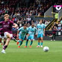 Zian Flemming scores from the penalty spot against West Ham United. Photo: Kelvin Lister-Stuttard