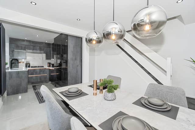 The spacious kitchen diner combines quartz worktops and generous storage with direct access to the private rear garden