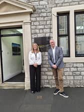 Amanda Hall (Houldsworth) and Ian Liddle (Farleys) are stood outside Houldsworth Solicitors following Farleys’ recent acquisition of the business.