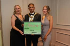 Fran's artwork - mum Nicola and sister Chlöe with the Mayor of Blackburn with Darwen, Councillor Mahfooz Hussain