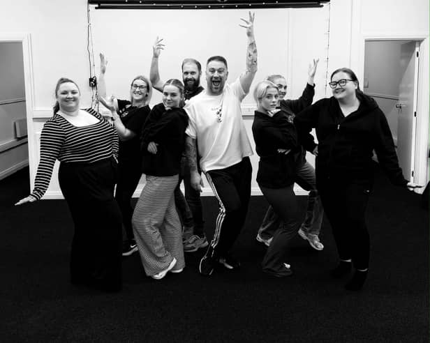 Some of the cast of 'Curtain Up for A Cause' in rehearsal for next month's show