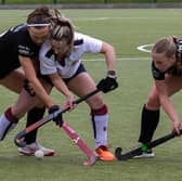 Pendle Forest's Hannah Metcalf and Amelia Hatton battle for the ball at Gloucester City