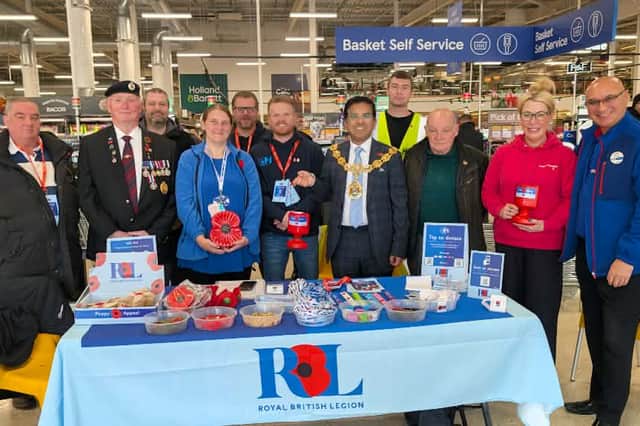 The Mayor of Pendle (fourth from right) with community champions, veterans and supporters of the Poppy Appeal at the official launch in Burnley's Tesco store