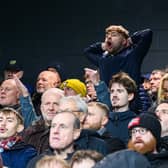 Burnley fans inside Sincil Bank for the Championship fixture against Lincoln City. Photo: Kelvin Lister-Stuttard