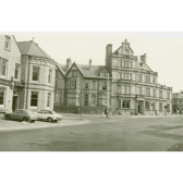 A photograph showing the front of the Sparrow Hawk Hotel in 1980 on the corner of Church Street and Ormerod Road, with the Talbot Inn in the foreground.

The Sparrowhawk was part of the original town centre of Burnley, known as the top o' the town. This area, located opposite the parish church of St. Peters, including the original Sparrowhawk, was knocked down and replaced by the newer buildings seen in the picture in 1896.