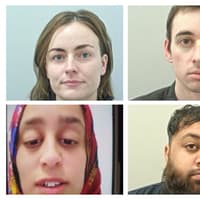 Four sentenced after windows smashed and red paint sprayed on Burnley bank