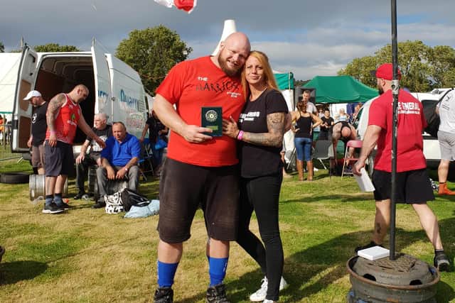 Matt Heys, with his fiancee Julie, after tying for first place at North East's Strongest Man last year.