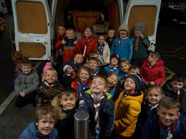 The beavers after their shopping trip to help fill the cupboards of needy families in Burnley.