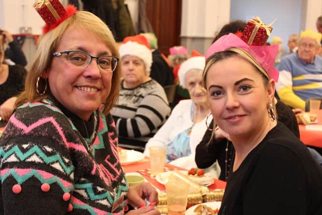 Manager Julie Harrison from Chapel Lodge, Worsthorne, and activities co-ordinator Katie McDonald with residents at the party.