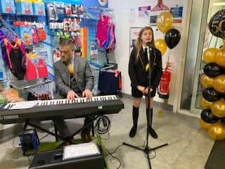 Shuttleworth year seven pupil Jolie Forrest serenades visitors to Padiham Leisure Centre as part of the 50th anniversary celebrations.