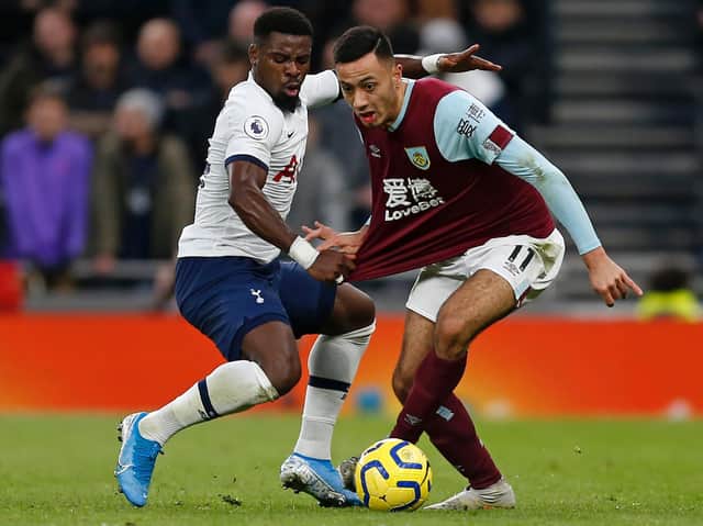 Burnley's Dwight McNeil takes on Serge Aurier at the Tottenham Hotspur Stadium
