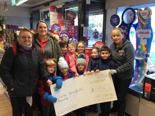 Staff and children from Earby Springfield Nursery were thrilled to receive a cheque for 6,305 from the Co-op Community Fund.