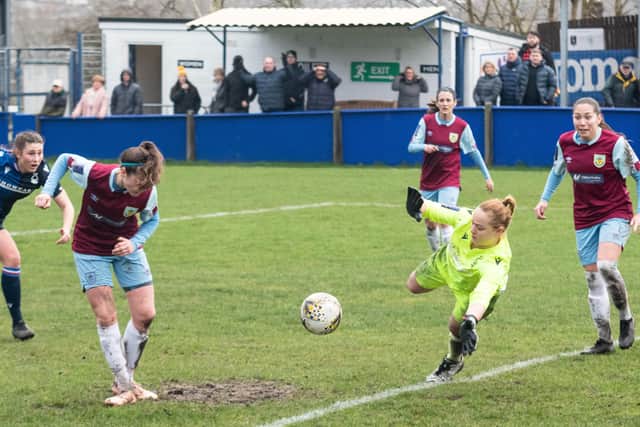 Evie Priestley forces a fine save out of the Nottingham Forest keeper.  Photo: Kelvin Stuttard