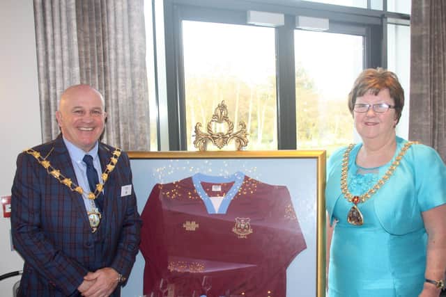 Showmen's Guild Lancashire Section Chairman Albert Hill with the Mayor of  Burnley, Councillor Anne Kelly, pictured with a Lancashire Showmen's Football Club (the team happens to play in the same claret and blue colours as Burnley FC)