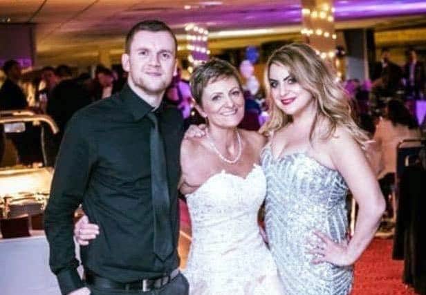 Karen Archer, who died last year at the age of 61 after a five year cancer  battle, with her son and daughter Wayne and Vickie.