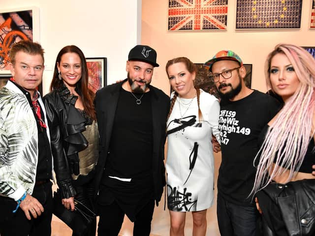 Paul Oakenfold, Phoebe St. Germain Fellows, Roger Sanchez, Allison Freidin, Alan Ket and Kristen Knight attend the opening of the Museum of Graffiti in Miami, Florida.
