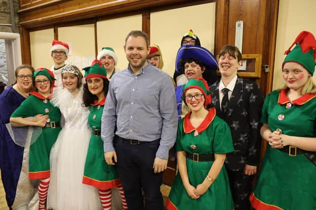Burnley's MP Antony Higginbotham with some of the cast of Team Rise's production of Santa We Have A Problem.