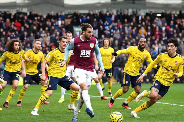 Burnley striker Jay Rodriguez is surrounded by Arsenal shirts during the goalless draw at Turf Moor