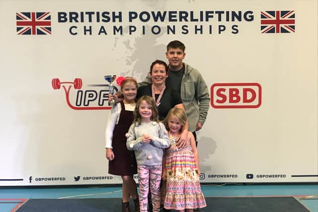Sinead with her children at the British Powerlifting Championships last year