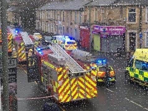 Fire engines and police vehicles at the scene of the blaze in Eliza Street, Burnley yesterday (photo by Anne Morrisey)