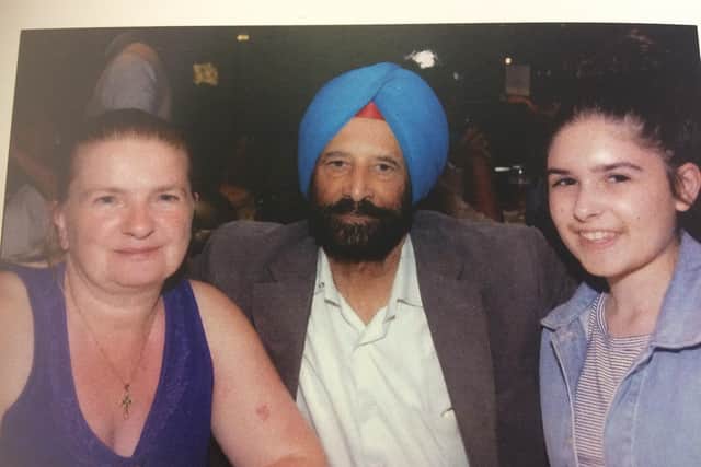 Dr Sidhu and his wife Julie with their daughter India.
